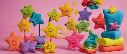 Explain the symbolism behind a star shape in a dreamy mood.,marzipan figures,neon candy corns,wooden toys,clothe pegs,clay figures,felt baby items,game pieces,cookie cutters,origami paper,stuff toy,pl