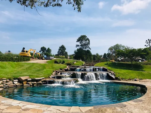 Artificial waterfall, artificial stream, flowing steps, shallow water, granite.,mineral spring,landscape designers sydney,indian canyon golf resort,feng shui golf course,indian canyons golf resort,lan