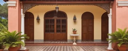 a pink and orange building that has two doors,porticos,porticoes,riad,peranakan,house entrance,hacienda,Photography,General,Realistic