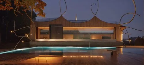 glass concrete garden pool people trees night view spotlight summer,pool house,hanging chair,floating huts,landscape design sydney,wooden sauna,wooden swing,inverted cottage,wooden decking,water sofa,