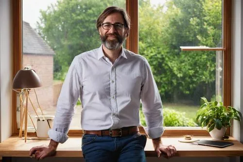 Middle-aged man, architectural designer, East Yorkshire native, brown hair, glasses, beard, casual wear, white shirt, dark blue jeans, brown leather belt, brown loafers, standing, working in office, w