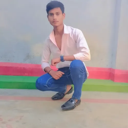 a man sits on the ground while wearing jeans,dheeraj,abhinav,aditya,bhardwaj,farkhar,saurav