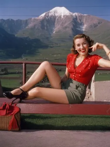 A single lady from the 1940s with bare legs and a red top in front of a mountain landscape, smiling and joking.,a lady sitting on top of a wooden bench,jane russell-female,maureen o'hara - female,jane