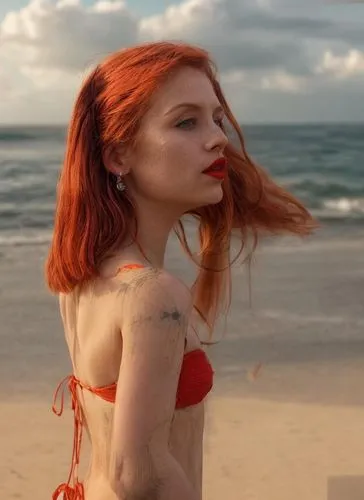  a portrait half body of a caucasian girl, aged between 23 years, red hair, blue eyes, red lips, stand tall on the sandy shore of a tropical beach. She's wearing a  black bikini . The beach is filled 