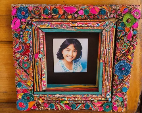 Create a heartwarming story about a picture frame found in an old attic.,digital photo frame,crayon frame,photo frame,child's frame,floral frame,watercolor frame,picture frame,wedding frame,henna fram