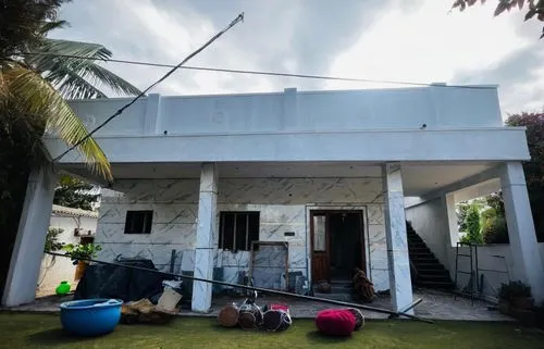 eleavate this imange and pain the colours with dark pink and cream,the entrance of the house is boarded up,rumah,tropical house,pondicherry,compound,backyards,seminyak,brabourne,vignetting,dhaalu,back