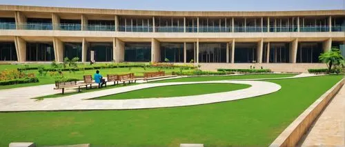 Modern architecture college campus, Gujarat, India, sunny day, blue sky with few white clouds, sprawling green lawn, contemporary buildings with curved lines, glass façade, steel beams, sleek stone fl