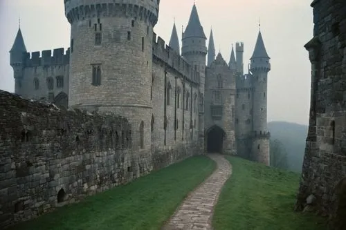 Medieval castle architecture, grand stone walls, Gothic towers, battlements, moat, drawbridge, portcullis, high ceilings, stained glass windows, intricate carvings, ornate doorways, suits of armor, ma