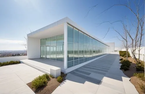 glass facade,glass wall,structural glass,siza,glass building,modern architecture,champalimaud,glass facades,mirror house,glassell,modern house,dunes house,snohetta,home of apple,cube house,futuristic art museum,phototherapeutics,glass panes,cantilevered,cubic house,Photography,General,Realistic