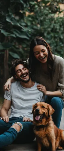 Couple sharing a laugh with their dog,dog photography,pet vitamins & supplements,home ownership,dog-photography,family dog,pet adoption,cosmetic dentistry,family photos,coronavirus disease covid-2019,