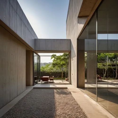 exposed concrete,dunes house,concrete slabs,concrete ceiling,cubic house,archidaily,concrete construction,corten steel,concrete blocks,concrete,modern architecture,cube house,frame house,concrete wall,modern house,residential house,glass facade,reinforced concrete,mirror house,contemporary