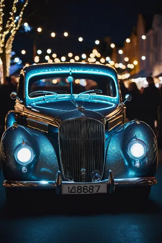 Photograph a classic car at a glamorous car show surrounded by dazzling lights.,jaguar mark 1,christmas retro car,jaguar mark 2,jaguar mark ix,jaguar s-type,bmw 501,jaguar mark vii,daimler sovereign,r