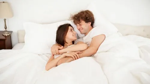 woman on bed,cuddling,as a couple,loving couple sunrise,girl in bed,young couple,romantic scene,bed linen,amorous,bed,bedding,couple - relationship,wedding ring cushion,comforter,cardiac massage,duvet