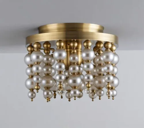 flush mount with glass ball frame finish in antique brass,white and gold chandelier with round ornaments hanging from the ceiling,ceiling light,sconce,wall light,ceiling lamp,sconces,chandeliered,ensc