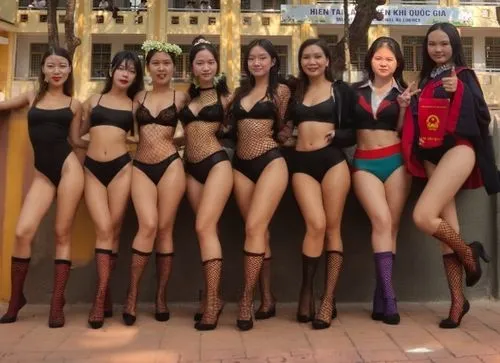 sexy fishnet,socks,,a group of women in very small outfits posing for a po,miss vietnam,fembots,asiaticas,bimbos,multibras,mannequins