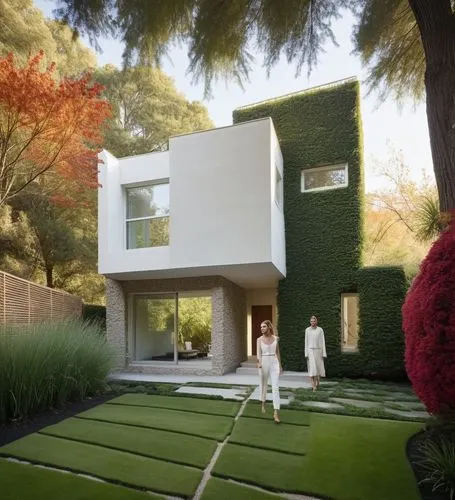 As you walk down the serene garden, you hear the soft hum of blooming flowers overhead, and they chime with an otherworldly energy. The exterior of the house is minimalist, complete with a wooden entr