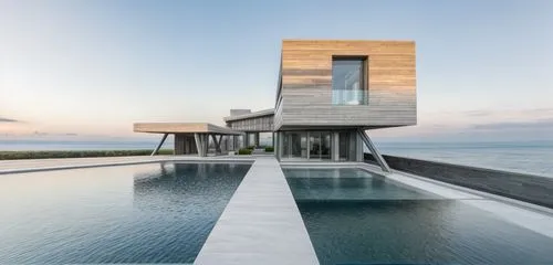 marble
,uluwatu,dunes house,modern architecture,house by the water,infinity swimming pool,modern house,cube stilt houses,luxury property,holiday villa,cube house,cubic house,beach house,house of the s