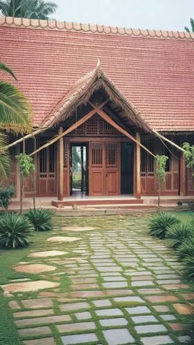 a symmetrical pitched roof kerala house, central entance with main door, either sides big glazed window, with front portion a pitched roof and either side higher roof pitched.  roof with mangalore til