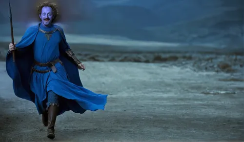 Blue-skin man hurriedly running wearing medieval robes over scale-armor and medieval trousers,mundi,bazlama,bordafjordur,the wanderer,blue enchantress,nebula guardian,walking man,avatar,prymulki,botar