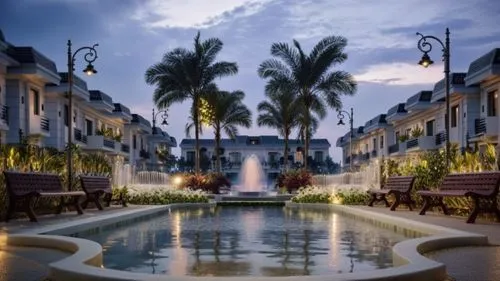 RESIDENTIAL COMPOUND WITH LANDSCAPE , PALM TREES AND FOUNTAINS, WHITE AND BLACK BUILDINGS,souk madinat jumeirah,beverly hills,madinat jumeirah,beverly hills hotel,royal palms,decorative fountains,nusa