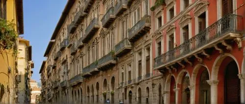 Naples Italy, historic building, ancient architecture, grandeur palace, Baroque style, ornate decorations, marble columns, arched windows, balconies with intricate ironwork, red-tiled rooftops, narrow