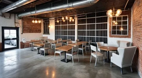 restaurant with concrete floors, chandeliers, shabby chic, off white limewash walls, ,the large room has tables and chairs in it,taproom,brick oven pizza,chefs kitchen,wine bar,contemporary decor,brew