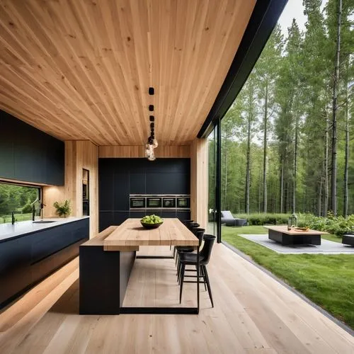 "Modern black log house made from square CLT (cross-laminated timber) logs. The exterior is sleek and minimalistic, with smooth black-stained timber beams. The house features large, floor-to-ceiling w