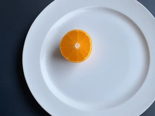 orange cut in half on white plate over blue background,egg yolk,egg sunny side up,egg dish,egg sunny-side up,a fried egg,breakfast egg