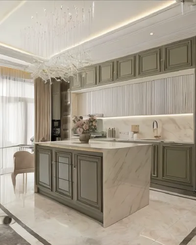 a kitchen is painted sage green, and has a large chandelier that hangs above the island,kitchen design,modern kitchen interior,modern kitchen,kitchen interior,luxury home interior,tile kitchen