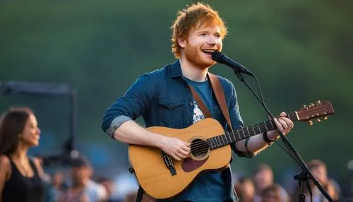 Ed Sheeran, singer, acoustic guitar, holding instrument, casual outfit, messy red hair, bright blue eyes, warm smile, gentle facial expression, standing, outdoor concert, festival atmosphere, sunset b