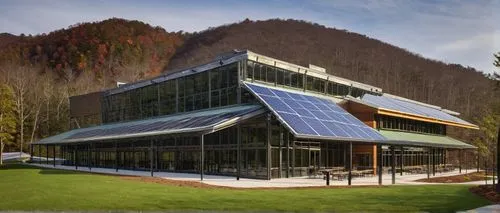 Appalachian State University, Building Science Architectural Design Studio, modern academic building, large glass windows, steel beams, wooden accents, green roof, solar panels, outdoor seating area, 