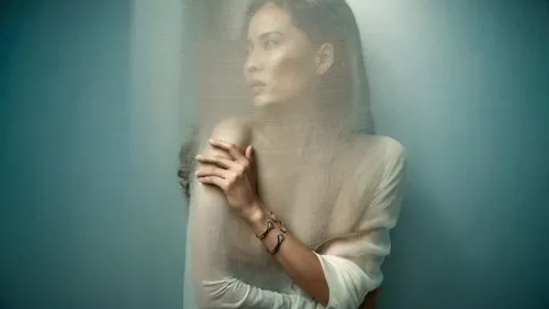 expand image as a youtube thumbnail same image rmove woman
,the woman in the sweater is posing for the camera,hosseinian,conceptual photography,hossein,transparence,ampt,hosseinpour