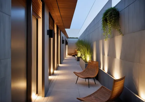 outdoor, open to the sky. English court in the basement of a luxury apartment building. feature wall design, sand and white rock texture tiles. with trailing plants in between. open to the sky.,landsc