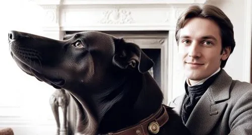 Un jeune marquis et son Dog allemand devant la cheminée du salon de style 1er Empire,man sitting down with dog in his lap, looking up,archdeacon,vicar,gundogmus,msgr,labradors,edgar,dachshund yorkshir