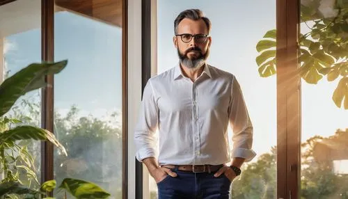 Middle-aged chief architect, home designer, solo, (40yo), black framed glasses, short brown hair, beard, casual wear, white shirt, dark blue jeans, brown leather shoes, holding a blueprint, standing i