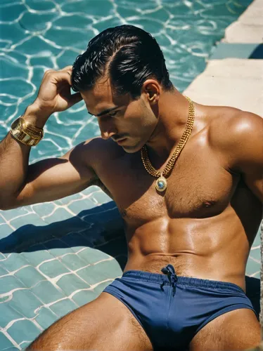 A 25 years old fit italian mafia man, 1950 vintage, sunbath toscane, swim brief, gold jewerly,swim brief,cary grant,model years 1960-63,two piece swimwear,swimmer,male model,poolside,swimwear,uomo vit