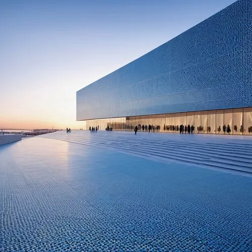 water wall,champalimaud,infinity swimming pool,snohetta,reflecting pool,bjarke,dhabi,songdo,soumaya museum,glass wall,harpa,futuristic art museum,abu dhabi,glass facade,jumeirah beach hotel,siza,lisbon,brasilia,aldar,kaust,Photography,General,Realistic