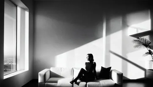 Sense of modern space in highest quality of living interior design. Award winning architecture, minimal, living room. Dramatic sun  lighting, A beautiful girl sited on sofa near the camera and smile ,