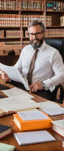 William Stallings, male, mature, glasses, beard, white shirt, formal trousers, sitting, desk, computer, books, papers, office, university, wooden floor, fluorescent light, 3/4 composition, soft focus,