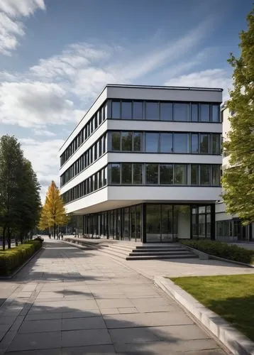 Bauhaus style building, Germany, modernist, functional, rectangular forms, clean lines, minimal ornamentation, large windows, steel frames, glass façade, flat roof, asymmetrical composition, urban set