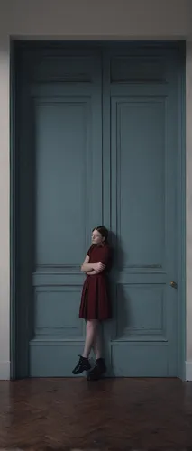 Within a Dream; in front of a closed door.,conceptual photography,photographing children,girl walking away,lonely child,exclusion,digital compositing,child's frame,in the door,girl in a long,the littl