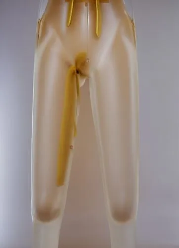 a model wearing an open stomach and a yellow belt,articulated manikin,artist's mannequin,piriformis,a wax dummy,figurine,gluteus,Photography,General,Realistic