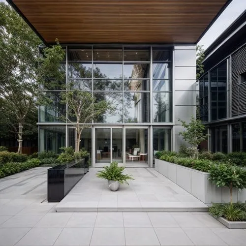 glass facade,landscape designers sydney,garden design sydney,landscape design sydney,modern office,office building,assay office,office buildings,modern architecture,corporate headquarters,company head