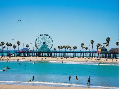 Southern California, sunny day, blue sky with few white clouds, palm trees swaying gently, warm sandy beach, crystal-clear turquoise water, surfers riding waves, Venice Beach boardwalk, colorful beach