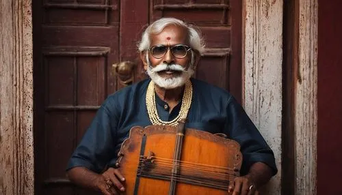 Bharathiyar, Indian classical music composer, sitting, traditional Tamil attire, veshti, angavastra, panchakacham, white beard, glasses, aged face, wrinkles, gentle smile, hands holding a tanpura, Ind