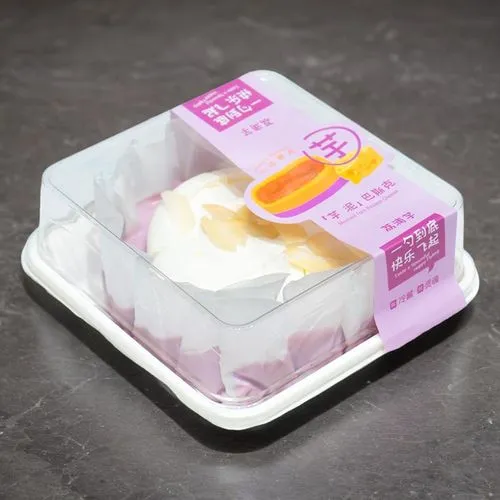 an empty box filled with chinese food and plastic,cream carton,beancurd,egg carton,yoghurt,curd cheese,blancmange,egg tray,aioli,chevre,qingyun,yogurt,egg white snow,yoghourt,curd,egg box,coconut cube