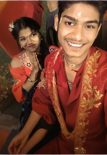 a man and woman posing for the camera,lavani,anirudh,raghav,baaja,sangeet,balaji