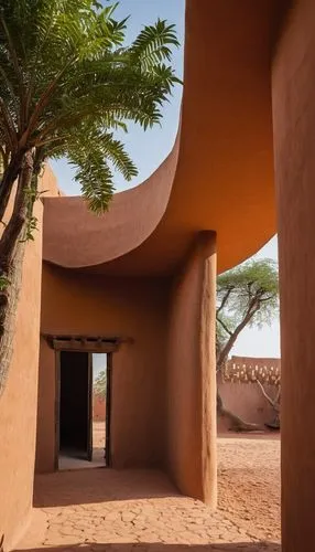 Francis Kéré Architecture, modern, Burkina Faso, West Africa, mud-brick, adobe, clay, sustainable, eco-friendly, natural ventilation, large overhanging roofs, curved lines, minimalist, earthy tones, w