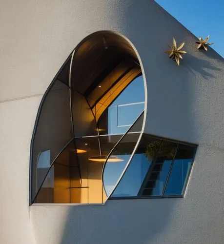 an unusual shaped window inside a white wall,arcosanti,seidler,guggenheim museum,walt disney concert hall,lubetkin,corbu,Photography,General,Natural