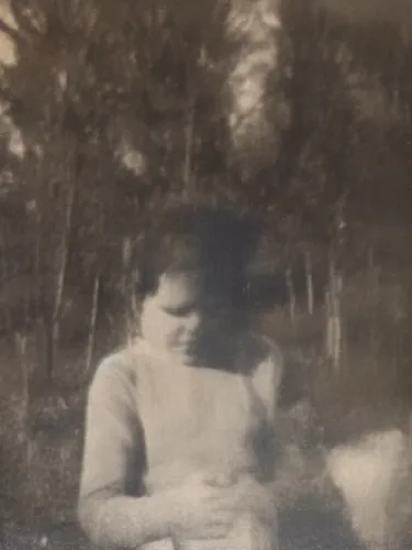 a woman wearing a sweater in the woods,tintype,jandek,born 1953-54,tintypes,abuelo,photos of children